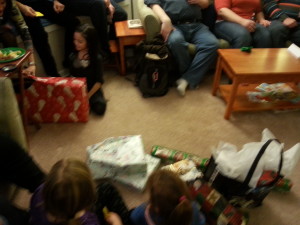 Children gathered, presents gathered, time for the gift exchange.