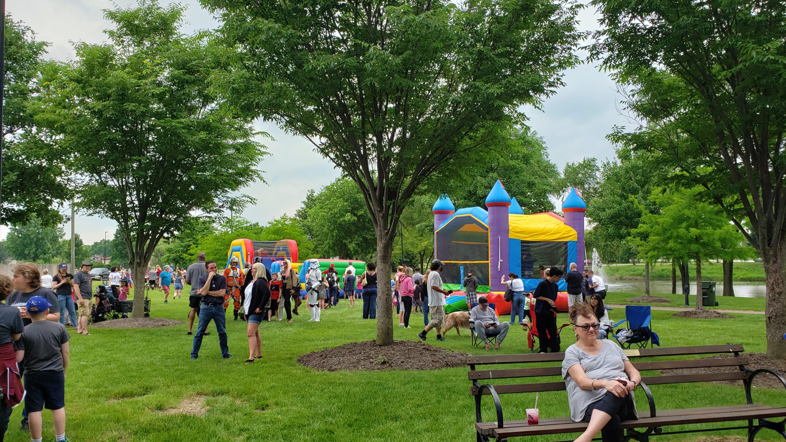 Park with bouncy house in background