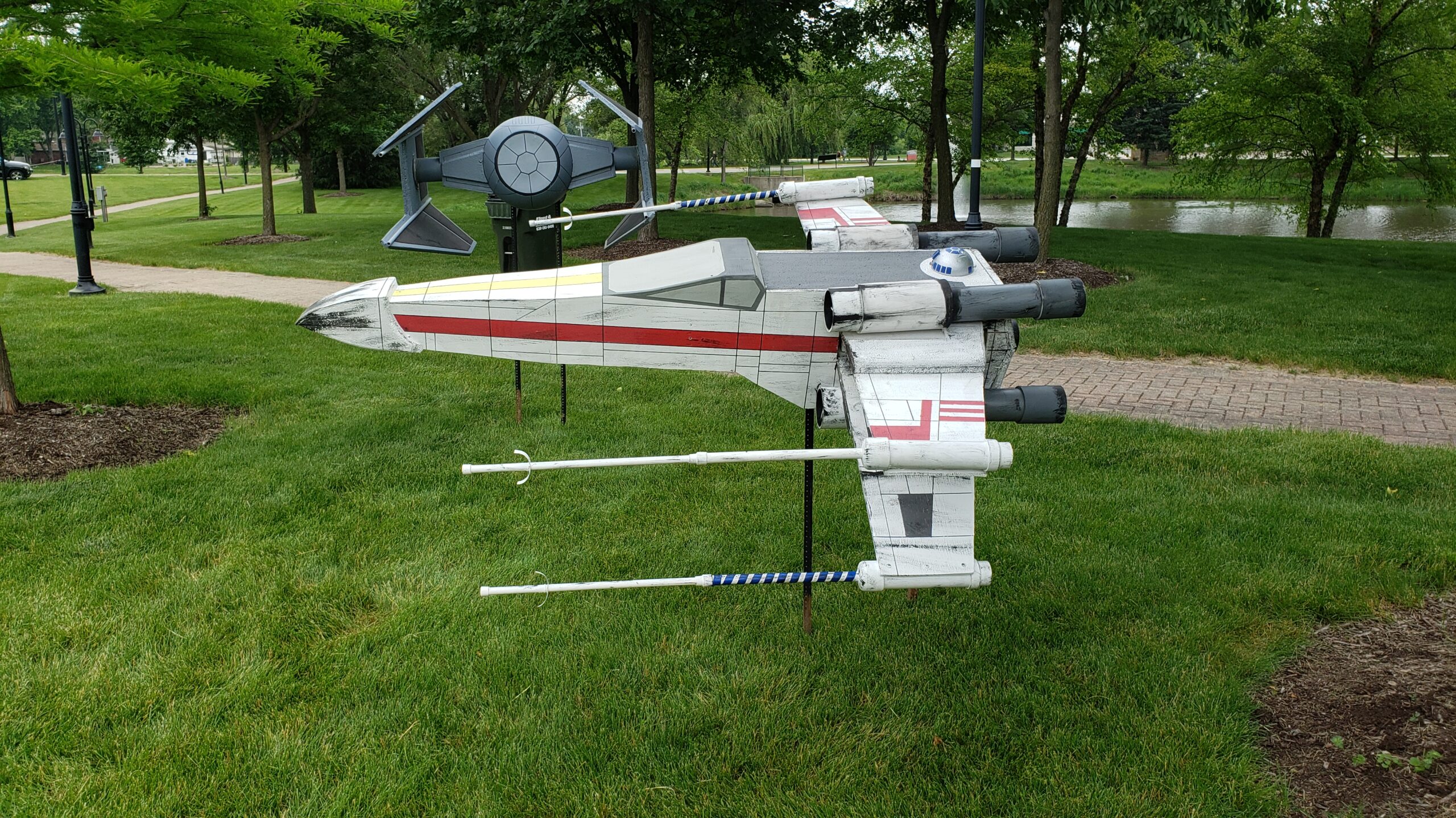 wooden x-wing and T.I.E. interceptor