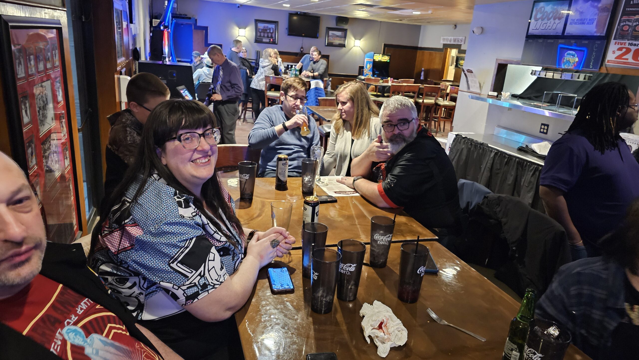 People sitting at table in bar