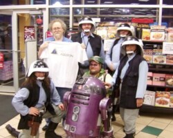 Troopers with Aaron Allston holding a t-shirt