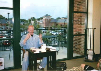 Probably saying something really profound, or swearing.